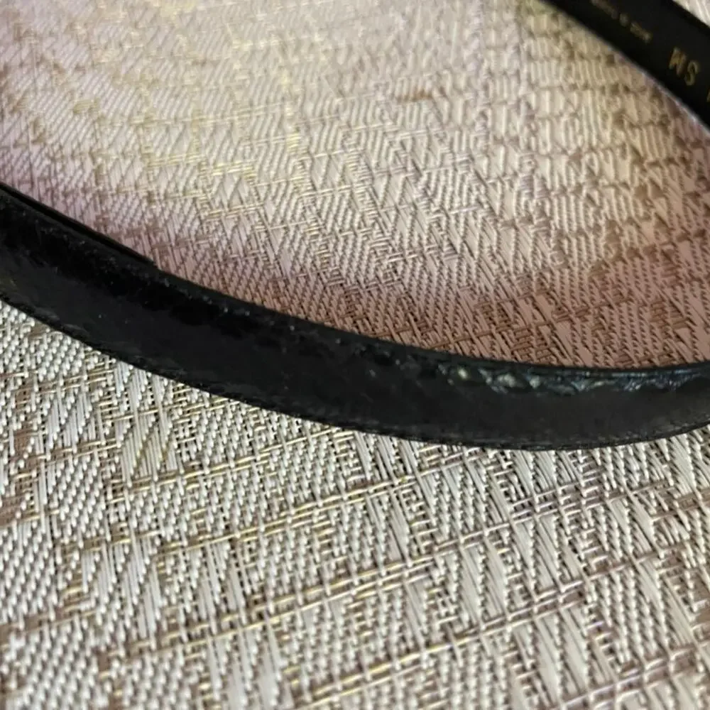 Vintage Dame black eelskin belt gold clip sz S